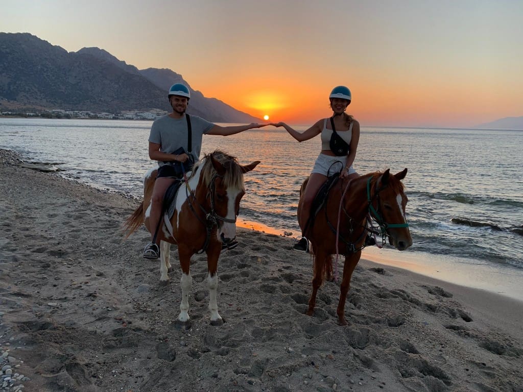 kardamenaorseriding sunrise beach ride holding the sun image 1